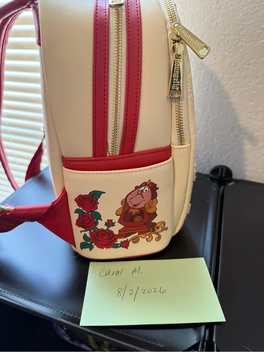 Loungefly Cream Belle Book-Scene Mini Backpack. Used once